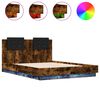 vidaXL Bedframe met hoofdbord en LED gerookt eikenkleurig 135x190 cm
