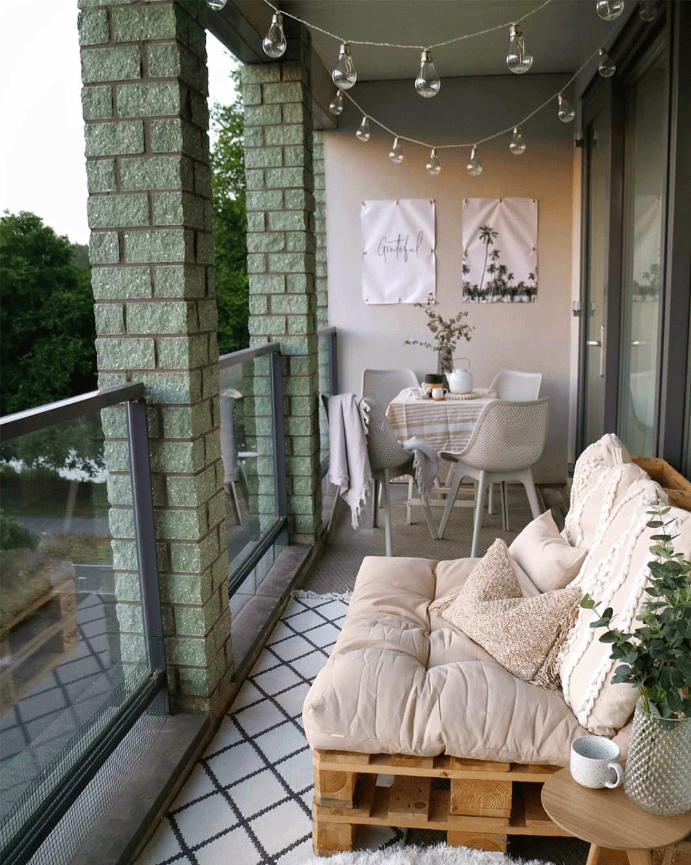 relax seating and a dining area on a balcony